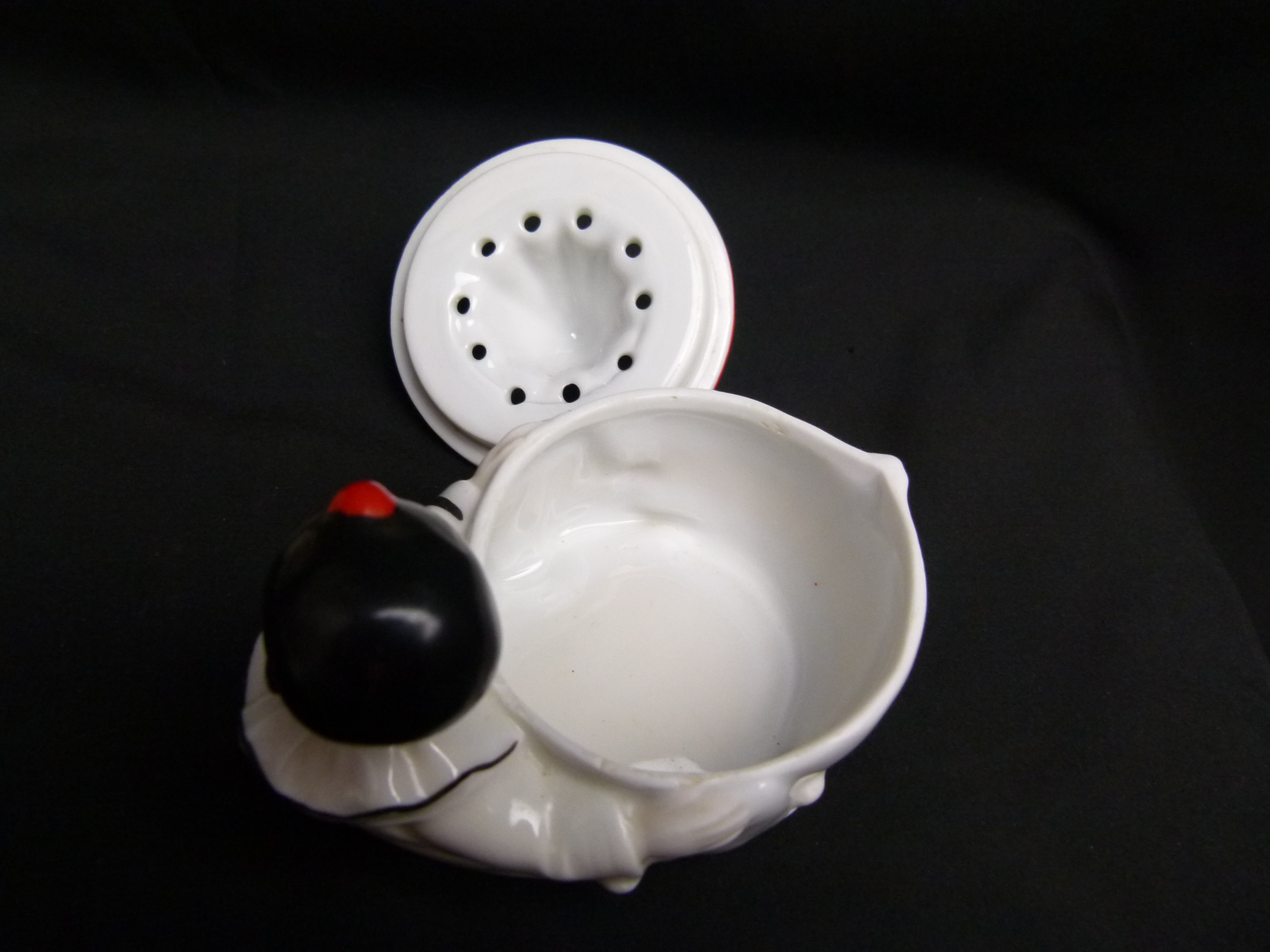 Antike Harlekin Zitronenpresse aus Porzellan