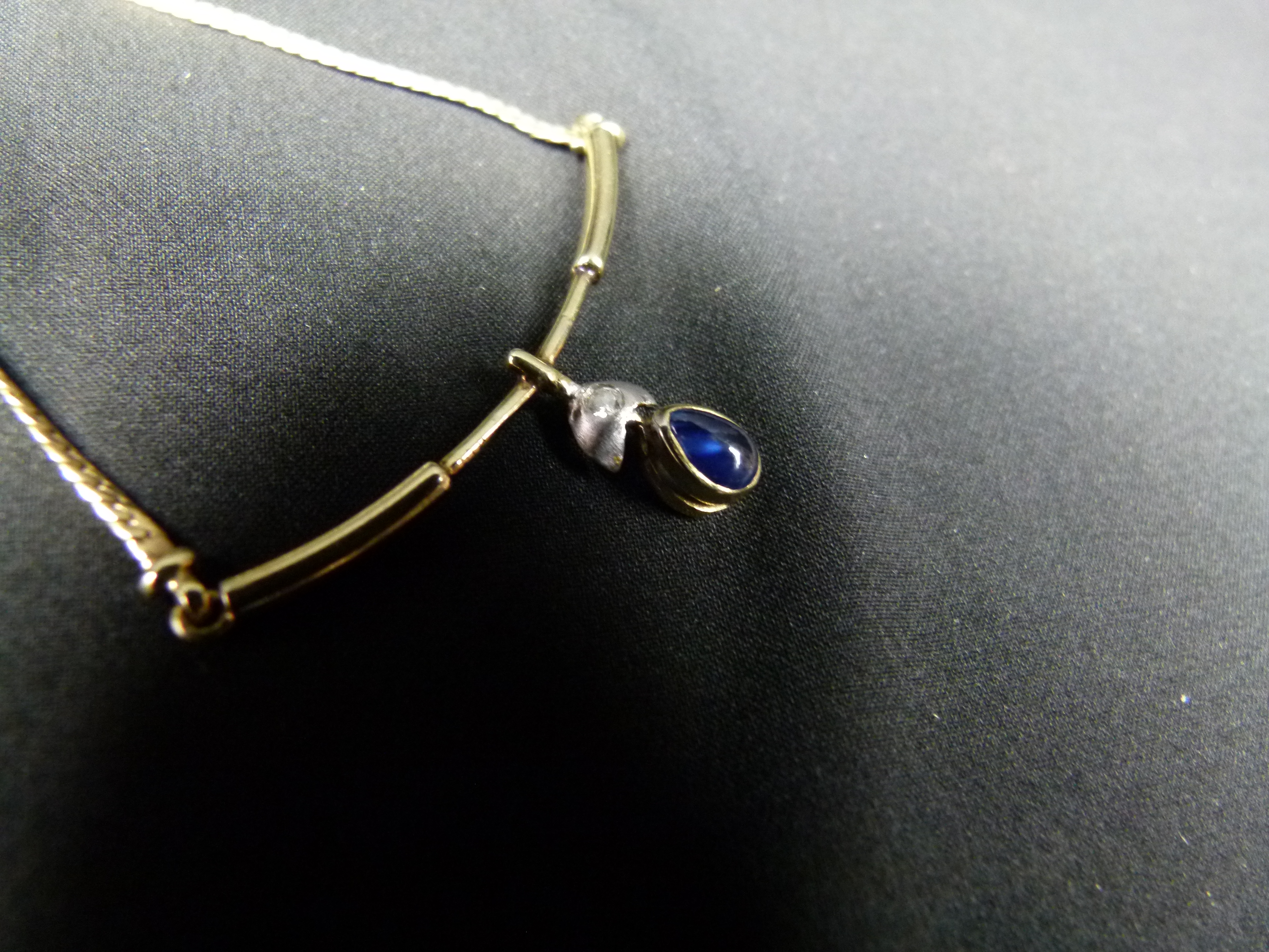 Ausgefallene Damenkette 925 vergoldet blauer Stein