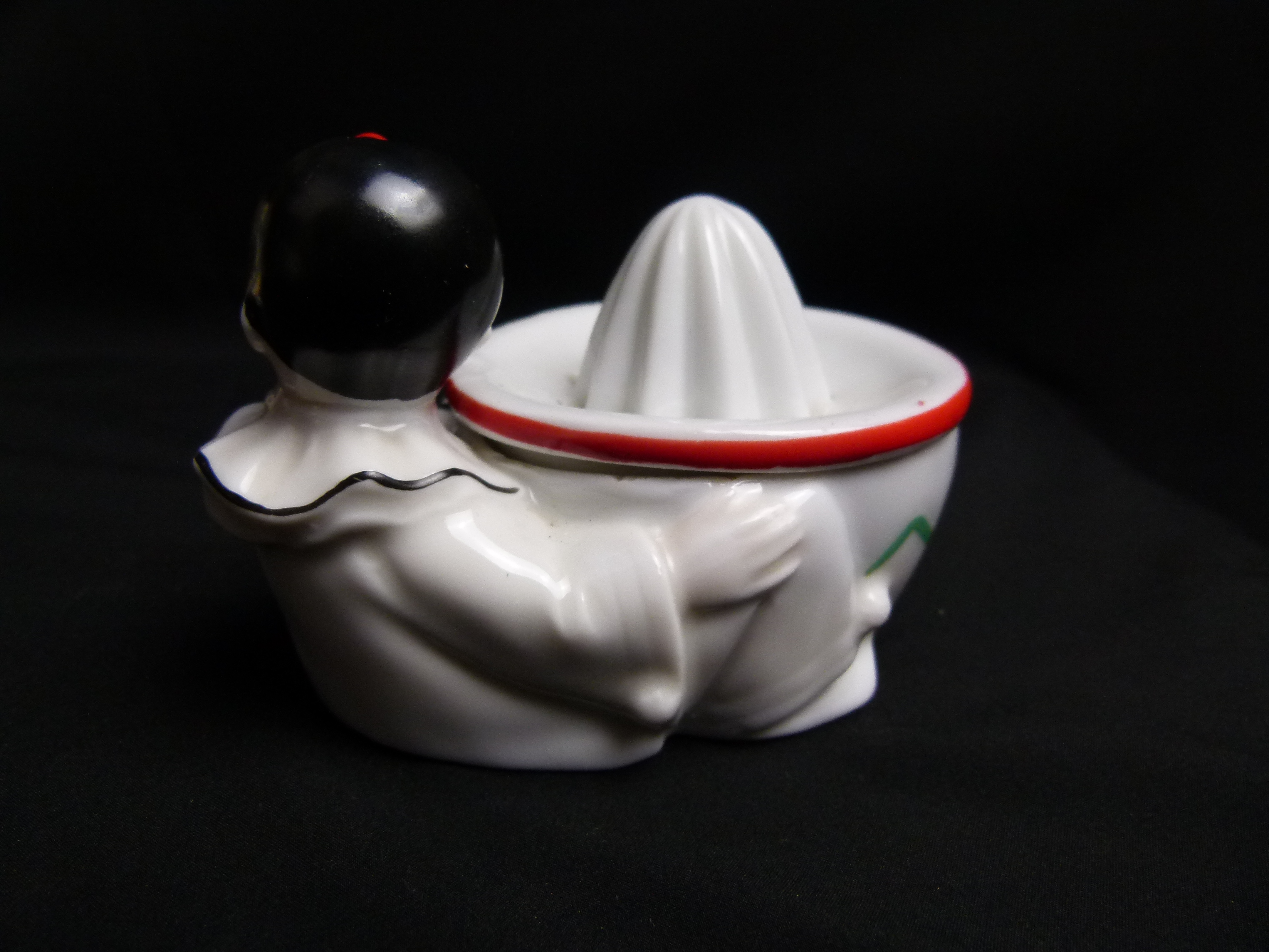 Antike Harlekin Zitronenpresse aus Porzellan