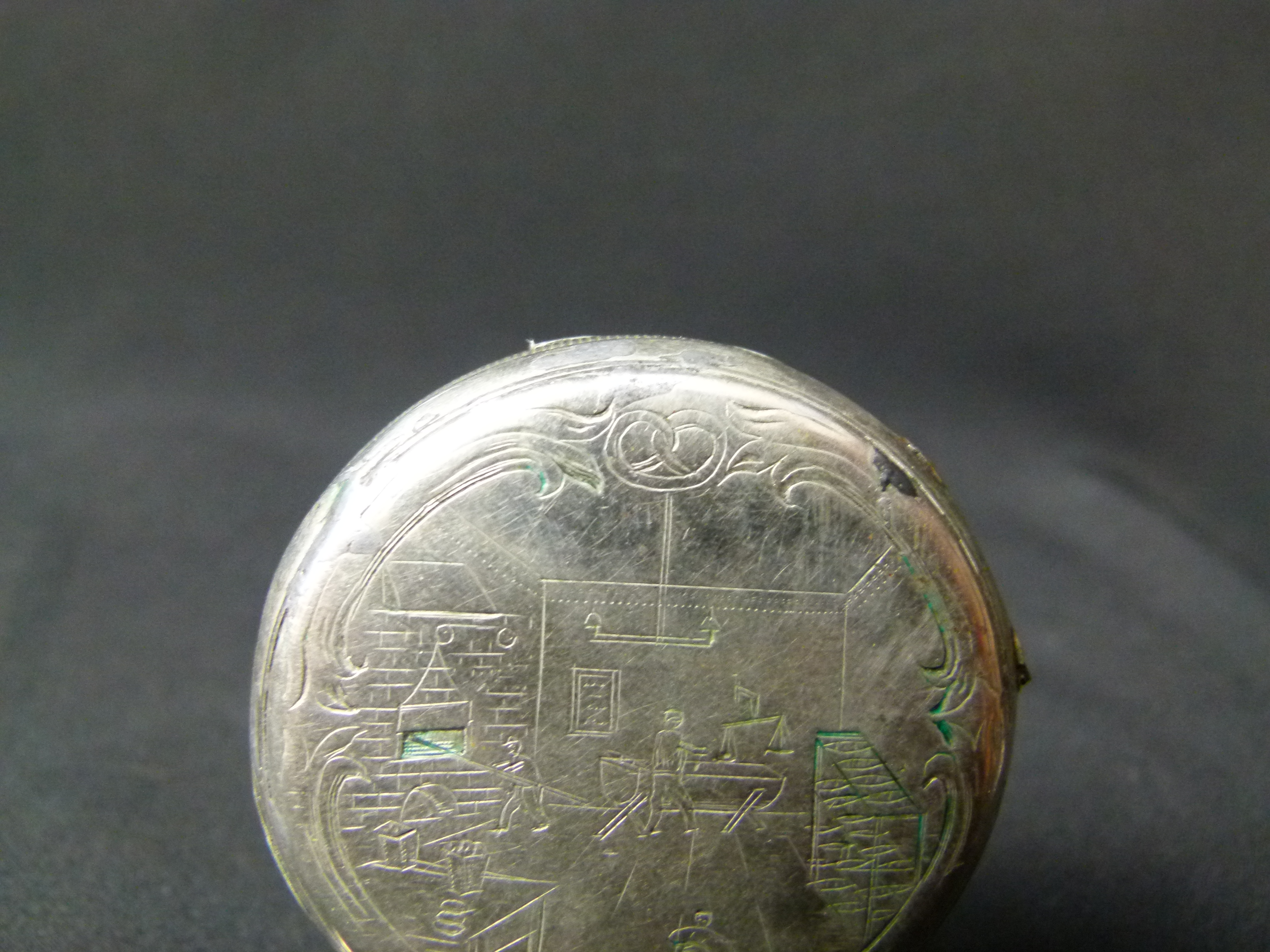 Antike Spindeluhr mit Gravur einer Backstube Ankre