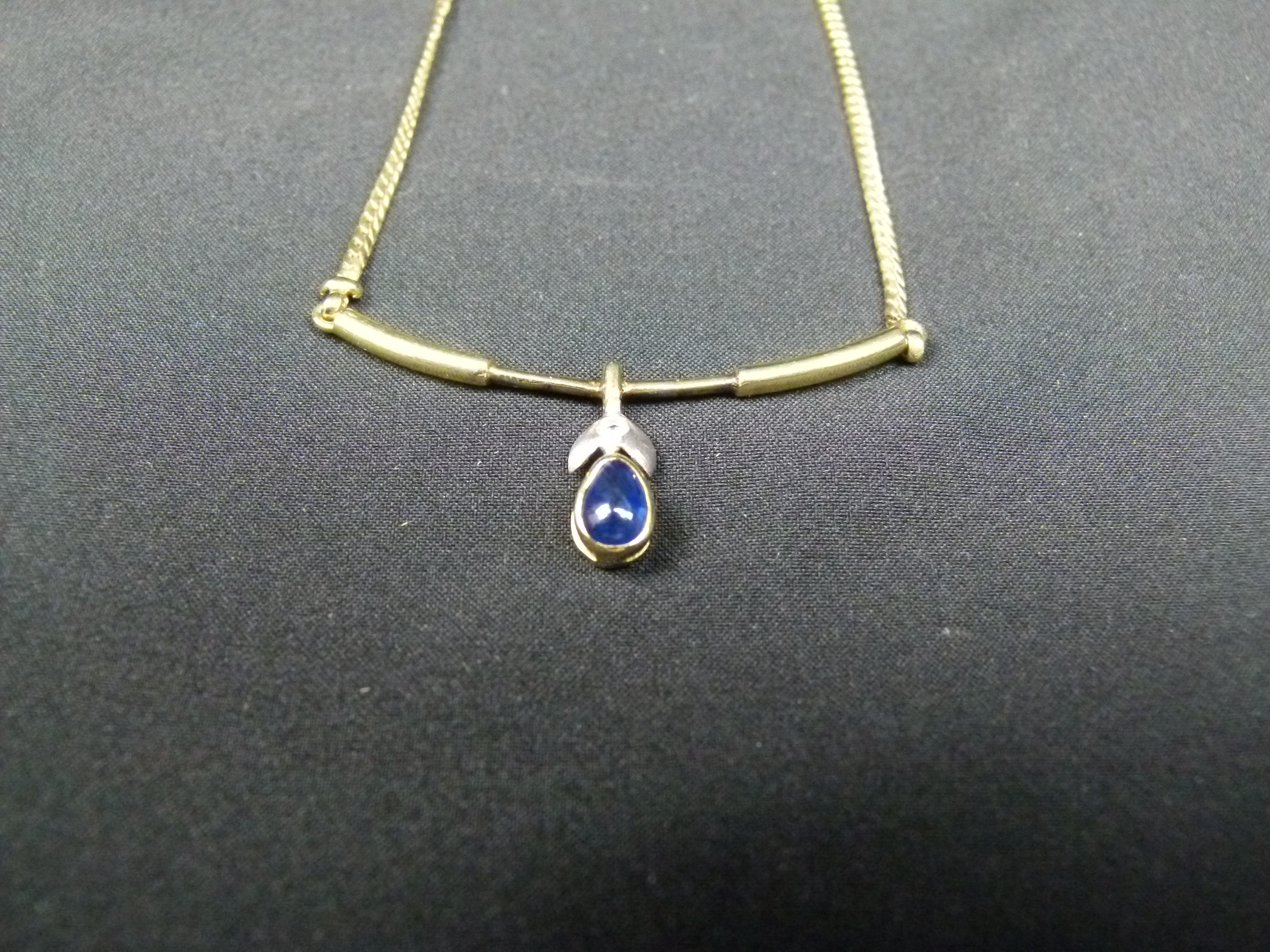 Ausgefallene Damenkette 925 vergoldet blauer Stein