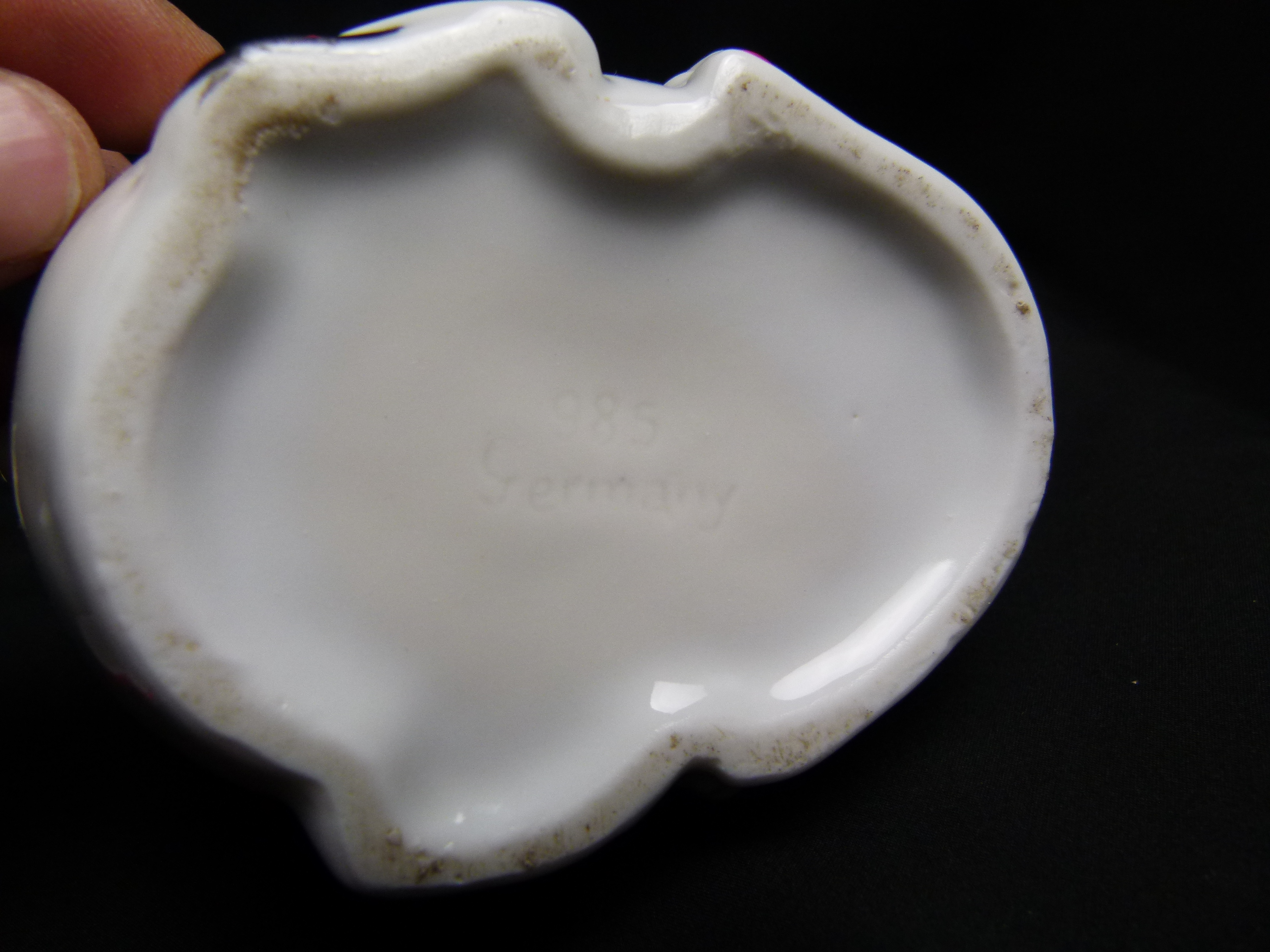 Antike Harlekin Zitronenpresse aus Porzellan